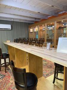 Alurent Scent Bar Interior with blending tables and bottles